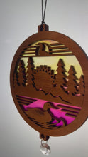 Load and play video in Gallery viewer, Loon Duck Forest Sunrise Lake Suncatcher - Sapele Wood Acrylic Lo1
