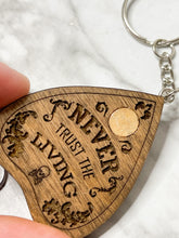 Load image into Gallery viewer, Halloween Ouija Planchette Keychain ~ Never Trust The Living
