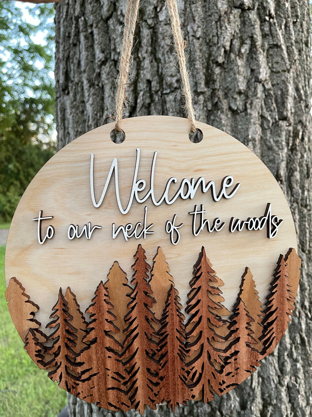 Welcome To Our Neck Of The Woods Layered Round Sign